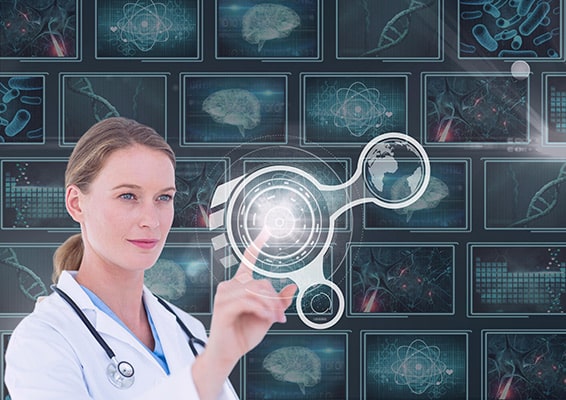 Reconstruct Face - A female doctor is pointing at a screen displaying surgical videos for facial reconstruction training.